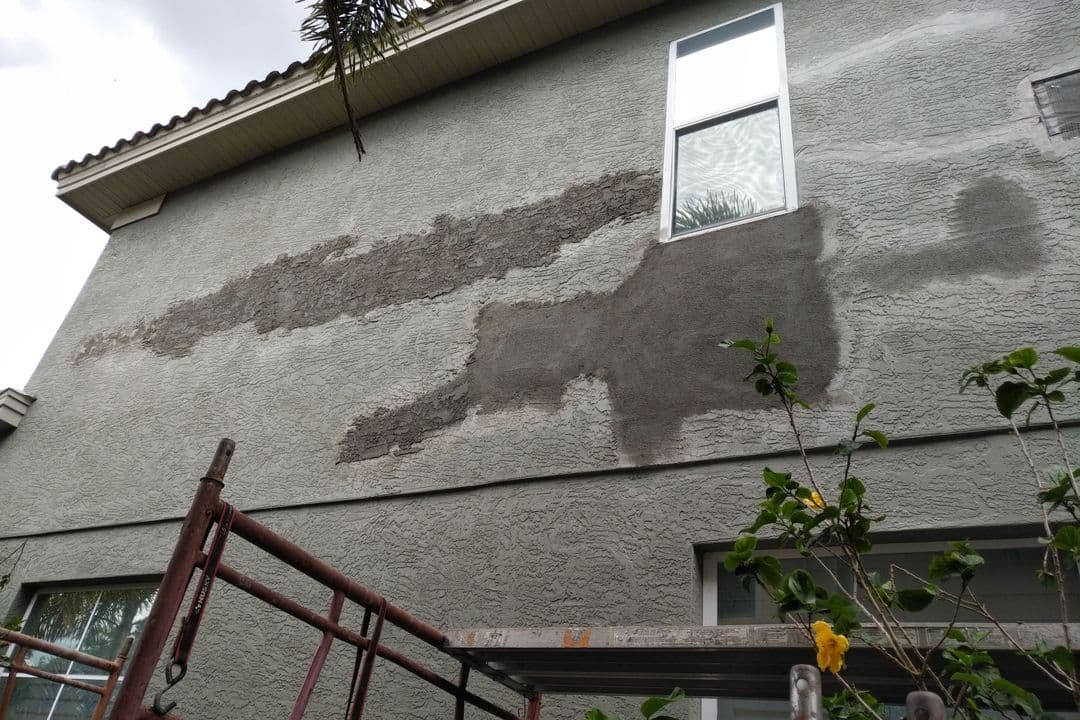 Dunedin stucco repair project by Revolution Contractors