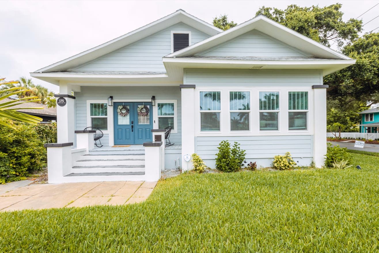 Finished light-blue 1920s bungalow with restored front porch — 175 19th Ave SE, Old Southeast historic home restoration
