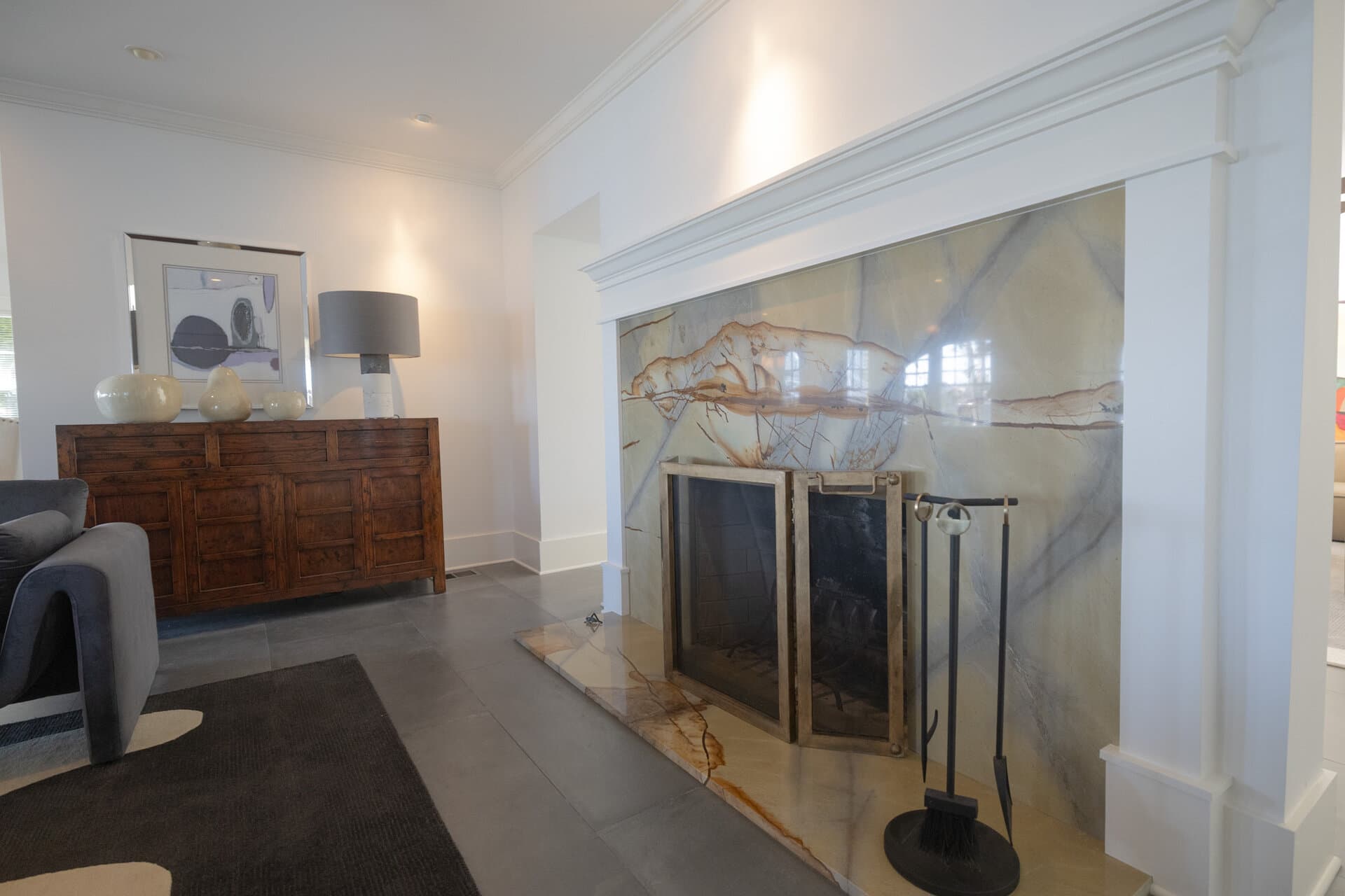 Dramatic marble slab fireplace surround in St. Petersburg home