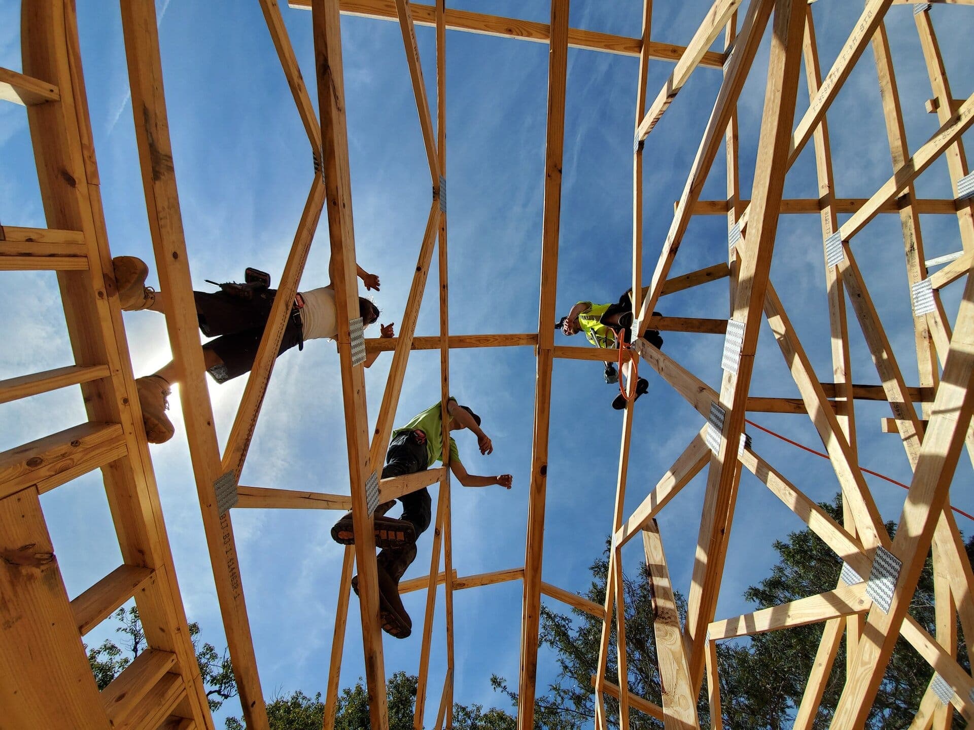 Revolution crew setting roof trusses on a St. Petersburg construction site